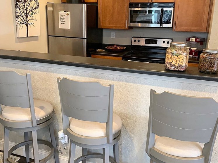 fully equipped kitchen at Prairie Walk apartments clubhouse